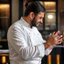 Image representing a chef and client reviewing menu plans